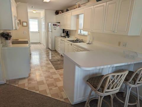 Kitchen back door provides direct access to your private pool.