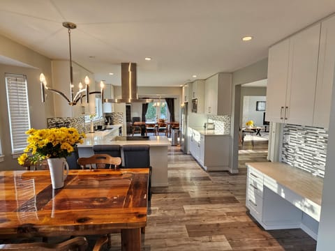 Breakfast room and kitchen. Desk located to the right.