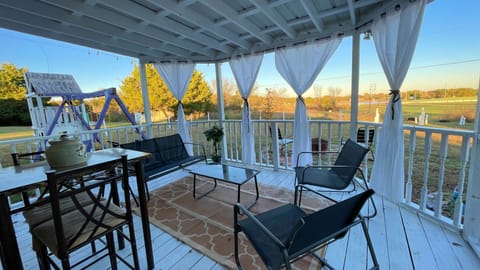 Enjoy your morning coffee in the back porch. The view of the pond is calming.