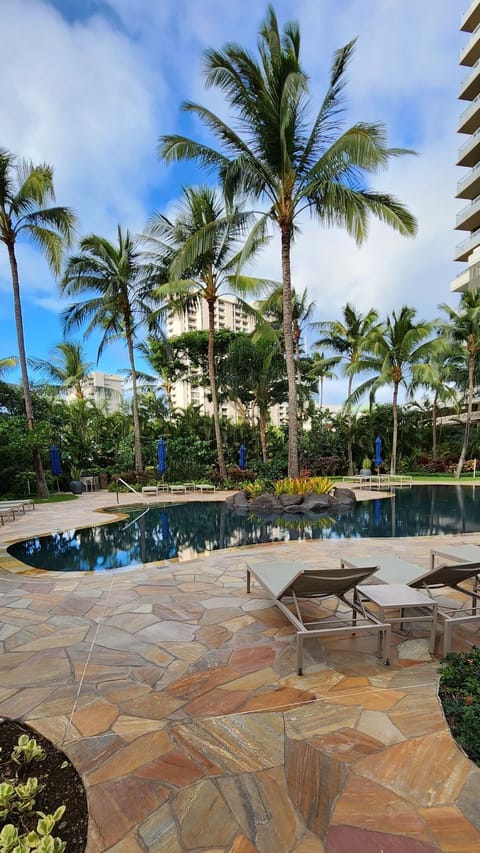 Infinity pool in lush tropical private garden