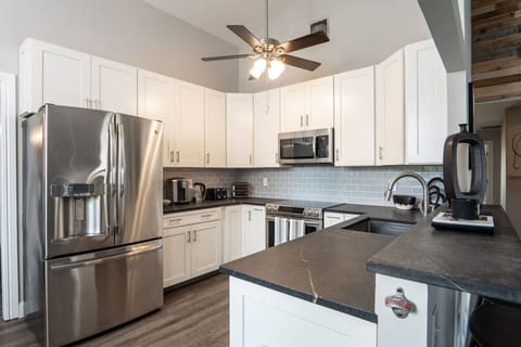 Bright kitchen stocked for home cooking