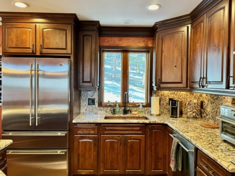 Enjoy the mountain views while using the copper sink 