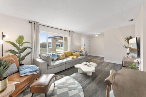 Enjoy an open dining and living area with a modern Scandinavian vibe