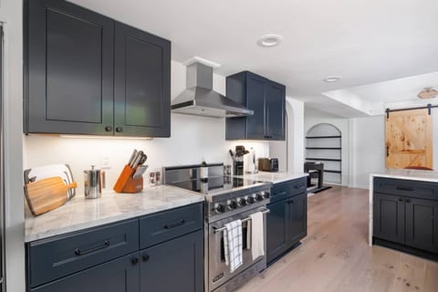 Quality appliances and a fully stocked kitchen await you.