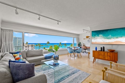 Welcome to our bright and open living area with panoramic ocean views, blending comfort with a serene coastal vibe for a perfect retreat.