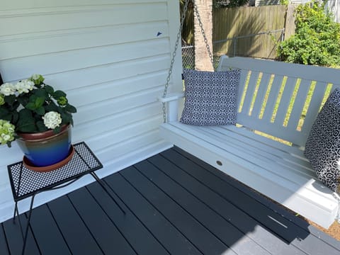 Breezy front porch with comfy swing.