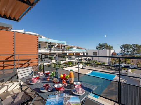 Sky, Furniture, Property, Table, Building, Chair, Shade, Interior Design, Outdoor Furniture, Window