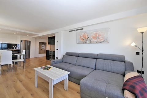 Lounge view from another angle with dining and kitchen to the rear