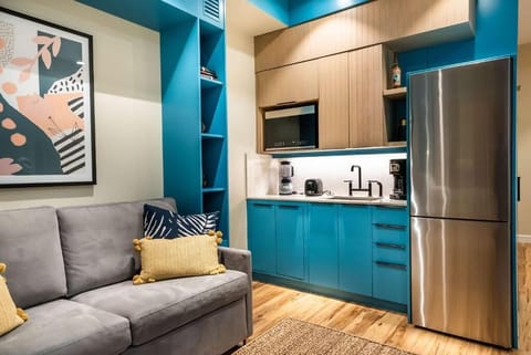 Cook with ease using the modern kitchenette and full fridge.