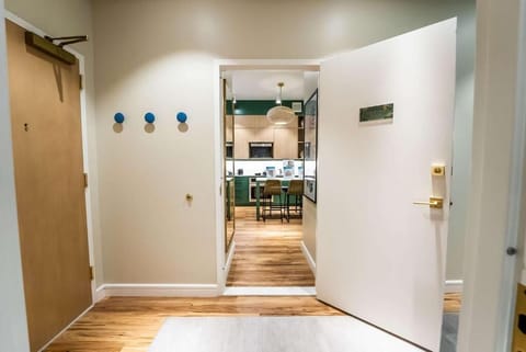 Step inside and glimpse the open layout and dining nook.