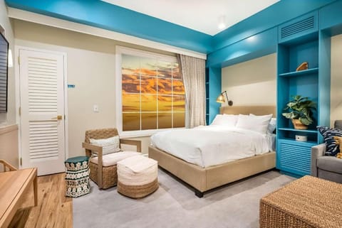 Sink into crisp linens and wake to warm sunset glow.