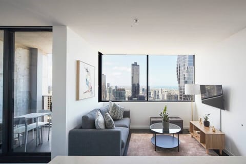 Take in the scenic views of the cityscape and the soothing ocean from the living area, adding an extra layer of tranquillity to your stay.