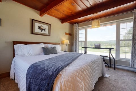 Sleep in a king size bed with nature right out the window.