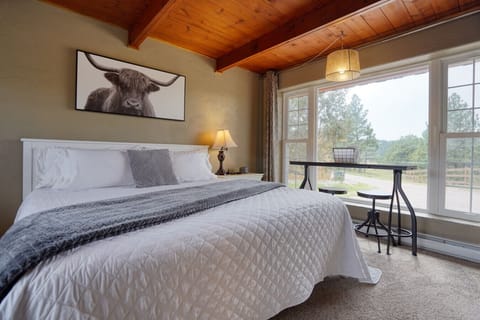 Enjoy views of wildlife from the king size bed.