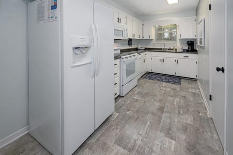 The spacious kitchen offers full size appliances!