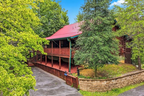 A charming cabin-style retreat tucked into lush greenery, offering peaceful seclusion with nature at your doorstep.