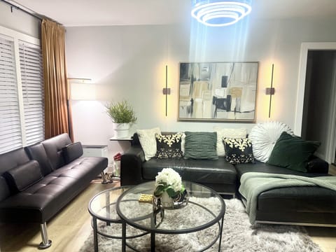 Sufficient space in the living room provides a cozy area for gatherings.