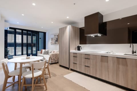 Gather for casual meals around the four-seater dining table for a cosy dining experience at home.