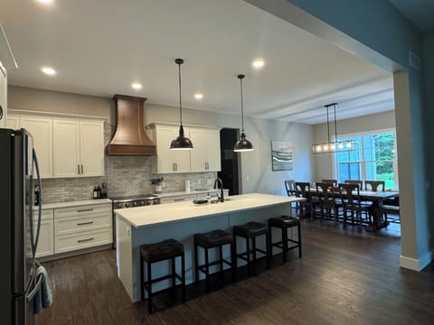 Fully stocked kitchen with additional bar seating