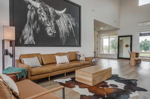 Unwind in elegance and coziness in our thoughtfully designed living room.
