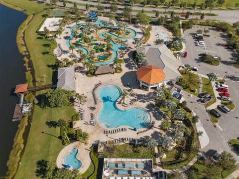 Taking in the breathtaking bird`s eye view of the pool and all its surrounding amenities. A perfect retreat from above! 🐦🏊‍♂️✨
