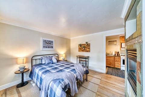 Main living space looking into kitchenette and dining area. View from entryway door.