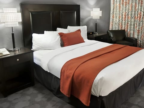 Settle in with bedside lighting and plush pillows for deep sleep