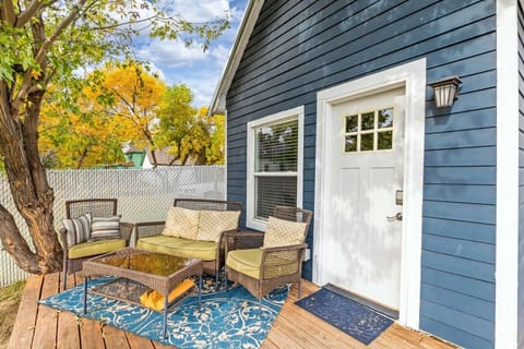 Private outdoor patio with comfortable seating at Cozy Great Falls Retreat by Wrecked & Refined. A peaceful space to unwind after exploring Great Falls, Montana.