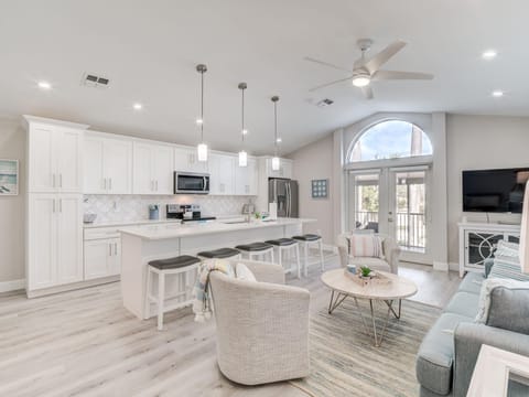Living Room: Bright and airy space with modern decor, perfect for relaxation and fun gatherings!