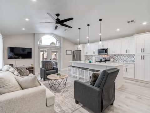 Open Living room and kitchen plus a smart TV