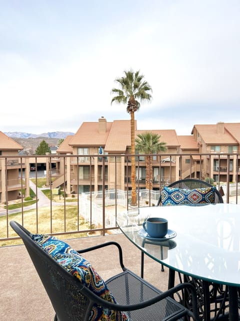 Daytime view from balcony, beautiful palm trees and mountain view