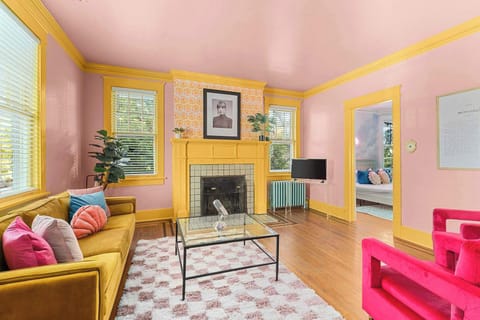 Where comfort shines in a colorful living room.