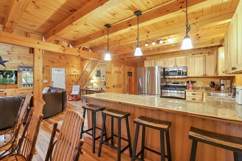 Barstools for 4 people at kitchen countertop.