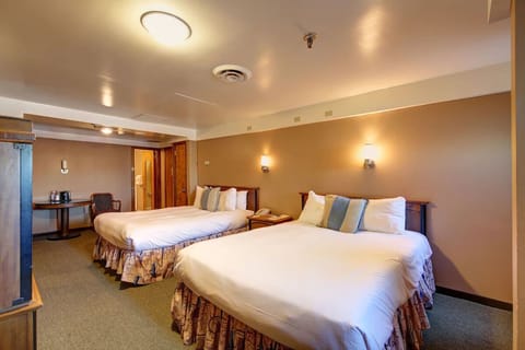 Rest easy in a spacious double room with soft lighting.