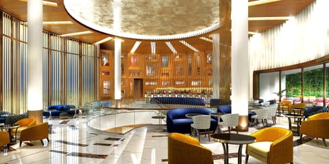 Arrive to a soaring, sunlit lobby made for grand entrances.