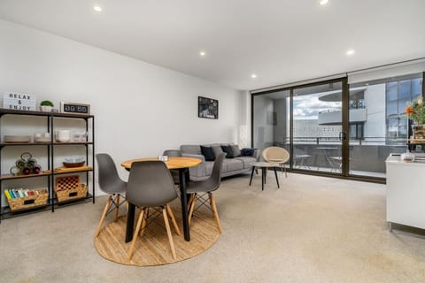 Enjoy the seamless flow of our combined dining and living space, where modern design meets functionality. The open layout is perfect for both entertaining and relaxing.