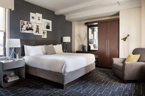 Settle into a stylish retreat with seating and ample storage.