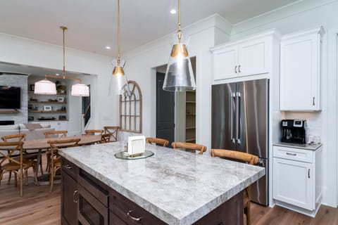 The dining area is adjacent to the kitchen