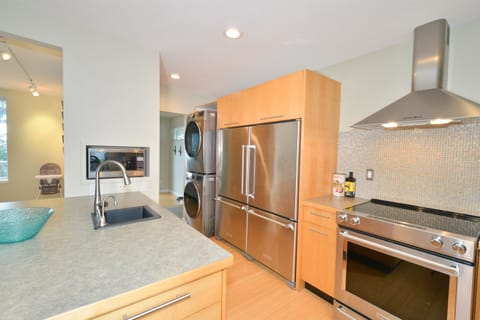 Spacious oceanview living room with cozy touches