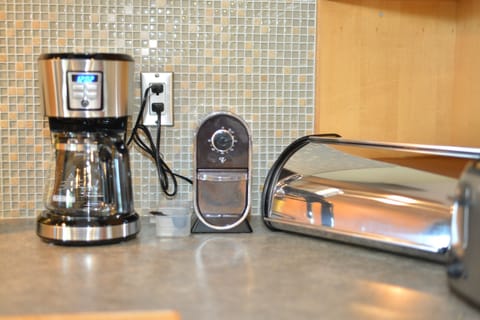 Ground coffee, filters, and a grinder included