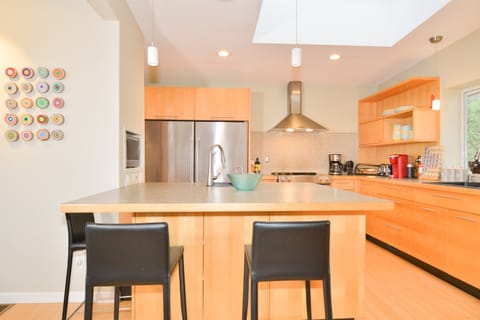 Spacious oceanview living room with cozy touches