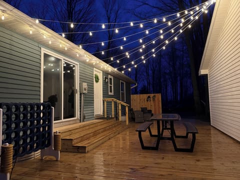 Expansive deck for eating, games, and relaxing.