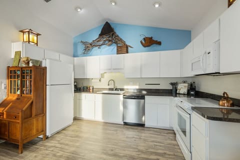 North unit fully stocked kitchen with lots of natural light