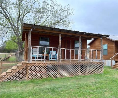 Comfy porch seating for enjoying the morning sunrise or evening stars.