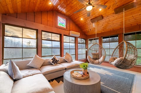Serene sunroom with heated floors and views
