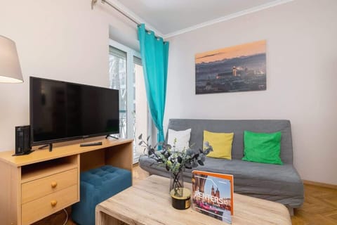 Relax in the stylish living room with a comfortable sofa and cosy decor.