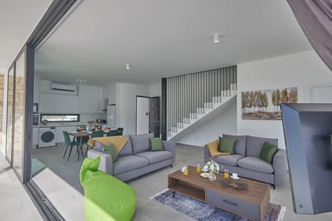 Modern open-plan ground floor living room, kitchen and dining area