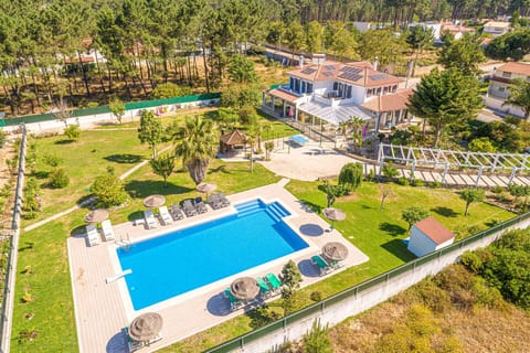 Luxury villa with pool and garden.