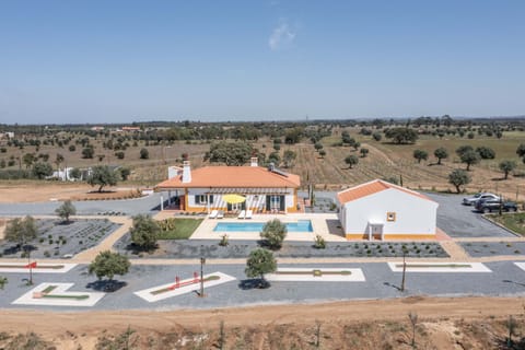 Aerial view of modern villa with private pool and sun terrace — Monte do Vale, holiday villa in Ferreira do Alentejo