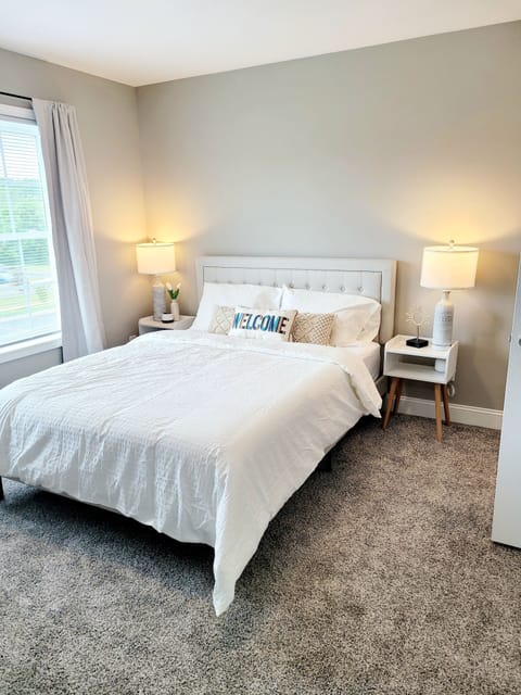 2nd Queen Bedroom, with walk-in closet, private 55" smart tv, and full ensuite